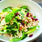 Warm Pearl Couscous Bowl with Spinach, Apple, Walnuts, and Tahini Dressing