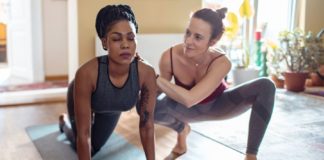 When It Is — and Isn't — Appropriate for a Trainer or Instructor to Touch You, According to Experts