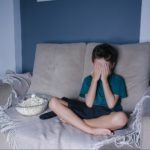 kid_watching_a_scary_movie-e1551790984235.jpg